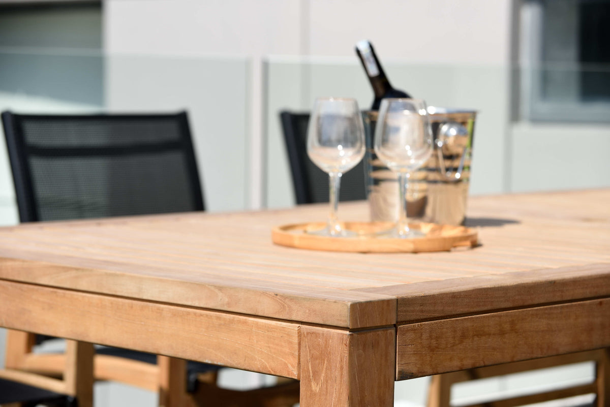 Rinjani 87-Inch Teak Dining Table with Fortuna Armchairs